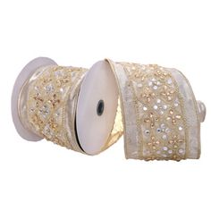 two rolls of white and gold ribbon with sequins on the side, one roll is