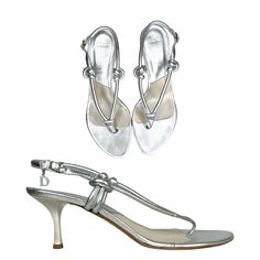 Get Ready To Shine In These Christian Dior Silver Metallic Thong Sandals! Perfect For Adding A Touch Of Glamour To Any Outfit, These Sandals Are Both Stylish And Comfortable. With A Size Of 37 1/2, They're Sure To Fit Just Right. Whether You're Strolling Along The Beach Or Hitting The City Streets, These Sandals Will Keep You Looking Chic And Trendy. Don't Miss Out On Adding A Dose Of Luxury To Your Spring/Summer Wardrobe With These Fabulous Dior Sandals! Excellent Pre-Loved Condition!! Elegant Silver T-strap Sandals, Thong Sandals Heels, Heeled Flip Flops, Spring Summer Wardrobe, Dior Sandals, Dior Shoes, City Streets, Thong Sandals, Summer Wardrobe