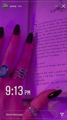 a woman's hand holding an open book with rings on it and the text, 9 13 pm send message