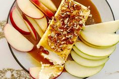 apple slices, caramel sauce, and sliced apples on a plate with pecans