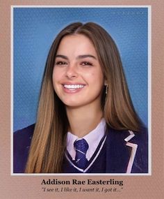 a young woman with long hair wearing a blue jacket and tie smiling at the camera