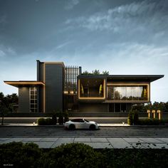 a car is parked in front of a modern house