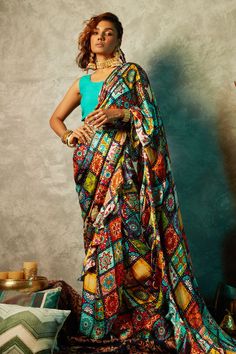 Multi color saree in modal satin base with all over tile prints.
Component: 1
Pattern: Printed
Type Of Work: Tile
Fabric: Modal satin
Color: Multi color
Other Details: 
Tile prints
Note: The blouse and belt worn by the model is not for sale
Occasion: Party - Aza Fashions Round Neck Sleeveless Blouse, Multi Color Tile, Green Sleeveless Blouse, Green French, Printed Tile, Ruffle Saree, Tile Print, Printed Saree, Indian Fashion Designers