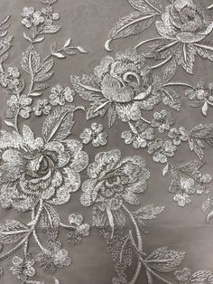 Content: 100% Silk Color: Off-White / Light Silver Width: 54 inches Embroidered Area: 50 inches Elegant Silver Floral Embroidered Fabric, Elegant White Embroidered Fabric And Notions, Elegant White Embroidered Fabric With 3d Embroidery, Elegant White Fabric With 3d Embroidery, Elegant White 3d Embroidered Fabric, Elegant Embroidered Fabric For Wedding With Tonal Embroidery, White Tonal Embroidery Fabric For Wedding, Elegant Tonal Embroidered Fabric For Wedding, Elegant Wedding Fabric With Tonal Embroidery