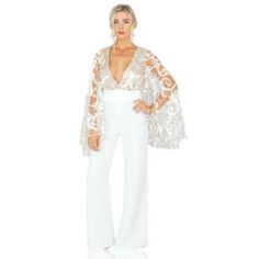 White L'abeye Galaxy Jumpsuit With A Plunging Neck, Bell Sleeves And Wide Leg Pants. Perfect For A Bride! Plus Size Wedding Pantsuits, Chic White V-neck Bodysuit, Glamorous White Long Sleeve Jumpsuits And Rompers, Spring Party One-piece Bottoms, Elegant White Bodysuit For Night Out, White Chic Jumpsuits And Rompers For Brunch, White One-piece Jumpsuit For Night Out, Chic White Jumpsuits And Rompers For Brunch, Glamorous Evening Bodysuit For Spring