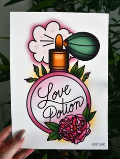 someone holding up a card with the words love potion on it