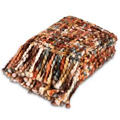 a pile of multicolored rugs sitting on top of each other in front of a white background