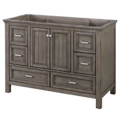 an image of a bathroom vanity with drawers and sink in grey wood finish, isolated against a white background