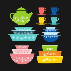 colorful bowls and teapots are arranged in the shape of a flowered pot