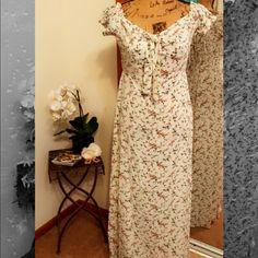 Floral Off-The-Shoulders Dress Material - 100% Polyester Color - Ivory/Multi Cream Spring Sundress Maxi Dress, Cream Sundress Maxi Dress For Spring, Spring Cream Maxi Dress, Spring Cream Casual Maxi Dress, Spring Cream Maxi Dress For Casual Wear, Spring Cream Maxi Dress For Casual Occasions, Off White Sundress Maxi Dress For Spring, Fitted Cream Casual Maxi Dress, Cream Fitted Casual Maxi Dress