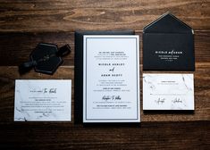 black and white wedding stationery with marble accents