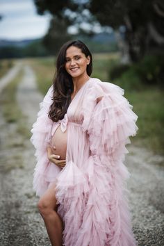 Introducing our exquisite collection of Boho-inspired maternity gowns, thoughtfully designed to make your maternity photoshoot a truly enchanting experience! 🌸✨ 👗 Elevate your Boho session with our stunning Boho dress, expertly crafted from the finest natural fabrics to ensure comfort and a seamless fit throughout your pregnancy journey. 📸 Capture the most beautiful moments with our curated selection of photo props, adding a touch of whimsy and charm to your maternity session. Your photographs will exude elegance and grace, reflecting the joy of this precious time in your life. 🤰 Embrace the ethereal beauty of our Vintage dress, a timeless piece that celebrates the essence of motherhood. Its delicate lace and flowing silhouette perfectly complement your radiant pregnancy glow. 🌿 At Ma Blush Tulle Dress, Photo Shoot Maternity, Kylie Jenner Baby, Pregnant Dress, Maternity Long Dress, Womens Boho Dresses, Pregnancy Journey, Photoshoot Dress, Maternity Gowns