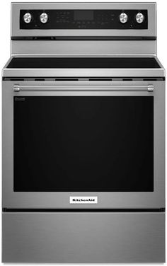 a stainless steel oven with the door open and an electronic display on top of it