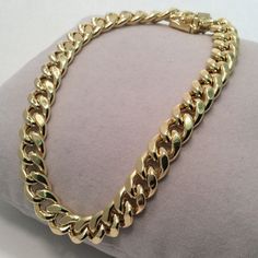 10k Yellow Real Gold Hollow Miami Bracelet 8.00 Inch 8.50mm Hollow Miami Links Metal Type: 10k Hollow Real Gold Weight: 13.10 Grams Width: 8.50mm Wide Length: 8.00 Inches Long Comes With A Gift Box Classic Hallmarked Cuban Link Jewelry, Classic 14k Gold Cuban Link Bracelet For Anniversary, Classic Gold Cuban Link Bracelet With 17 Jewels, Classic Gold Cuban Link Bracelet For Anniversary, Classic 14k Stamped Round Chain Bracelet, Elegant Gold Hallmarked Cuban Link Bracelet, Elegant 14k Gold Cuban Link Bracelet For Formal Occasions, Elegant Yellow Gold Cuban Link Bracelet For Anniversary, Elegant Gold Cuban Link Bracelet For Anniversary