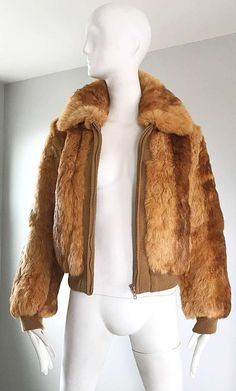 For Sale on 1stdibs - Chic 1970s luxurious rabbit fur bomber style jacket! Classic brown / copper color literally matches everything. A classic silhouette with a fantastic fit! Vintage Fur Jacket, 70s Jacket, Brown Copper, Brown Fur, Classic Brown, Vintage Fur, Classic Silhouette, Rabbit Fur, Copper Color