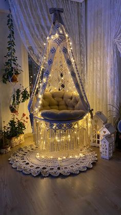 a chair that has been decorated with fairy lights