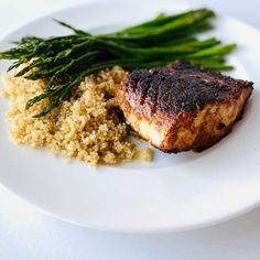 the meal is prepared and ready to be eaten on the plate with asparagus