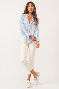 image of a female model wearing a LOLA OVERSIZED SHIRT BLUE STREAK DEAR JOHN DENIM Spring Blue Shirt With Striped Cuffs, Blue Shirt With Striped Cuffs For Spring, Blue Blouse With Striped Collar In Relaxed Fit, Blue Blouse With Striped Collar And Relaxed Fit, Spring White Shirt With Striped Cuffs, White Shirt With Striped Cuffs For Spring, Summer Long Sleeve Tops With Striped Cuffs, Relaxed Fit Button-up Shirt With Striped Cuffs, Summer Tops With Striped Cuffs And Long Sleeves