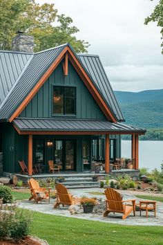 a house that has some chairs in front of it