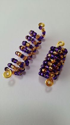 Beaded Loc coil made with 4mm purple and gold glass seed beads on a gold plated aluminum coil. Hole sizes fit small to medium locs or braids, 5 to 8mm or 8 to 14mm.  Sold individually. Locs With Accessories, Medium Locs, Butterfly Hair Accessories, Bridesmaids Hair, Braid Jewelry, Hair Coils, Loc Jewelry, Dread Beads, Butterfly Hair