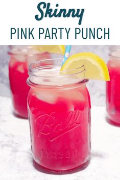 pink party punch in mason jars with lemon wedges