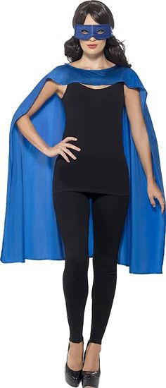 a woman in a black bodysuit and blue cape is standing with her hands on her hips