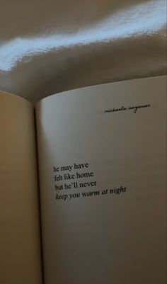 an open book with some writing on it