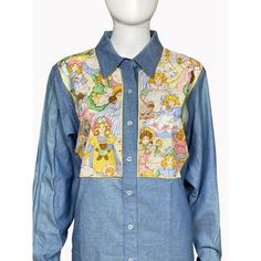 Embrace A Retro Vibe With The Quacker Factory Small Button-Up Denim Long Sleeve Doll Print Shirt. New Without Tags, This Vintage Style Piece Is Made From 100% Cotton In A Classic Blue. Quacker Factory Brand Small Size Button-Up Style Long Sleeves Doll Print Design Vibrant Blue Color 100% Cotton Material Vintage, New Without Tags Features: New Without Tags Size: Womens Small Measurements: Chest 43 In / 109 Cm Length 30 In / 76 Cm Condition: New Without Tags Blue Denim Patchwork Top, Blue Patchwork Denim Top, Blue Patchwork Cotton Denim Top, Blue Cotton Denim Top With Patchwork, Blue Cotton Patchwork Denim Top, Cute Blue Denim Tops, Vintage Blue Button-up Denim Top, Vintage Denim Blue Top For Spring, Retro Denim Blue Tops For Spring