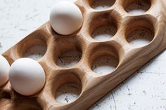 an egg tray with six eggs in it