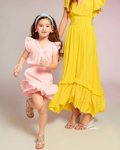 From playground to play date, dress your little one up in the Girls Lola Ruffle Mini Dress for her next day out with friends. Coordinate with your cutie by wearing the matching Lola Ruffle Mini Dress, and prepare to be the prettiest duo in sight. Spring Ruffle Dress For Playdate, Spring Twirl Dress With Ruffle Hem For Playdate, Summer Ruffle Dress For Playdate, Princess Style Ruffle Dress For Summer, Summer Princess Ruffle Dress, Ruffled Twirl Dress For Playdate, Playful Twirl Dress With Ruffle Hem For Playdate, Playful Ruffle Twirl Dress For Play, Playful Ruffled Twirl Dress For Play