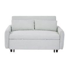 a white couch with two pillows on the back and one arm folded up to it's side