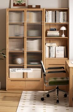 an office area with a desk, chair and bookcase