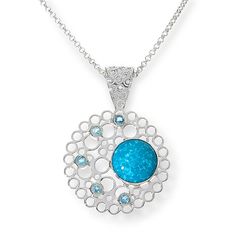 Jay King Sterling Silver Turquoise and Blue Topaz Pendant with Chain  Adorn your neckline with beautiful blue gemstones in a chic, contemporary pendant design. This handcrafted piece features a Sonoran blue turquoise paired with sparkling blue topaz accents atop a sterling silver, honeycomb base. Popcorn chain necklace included. From Jay King.       Pendant approx. 1-13/16"L x 1-1/4"W     Chain approx. 26"L x 1/16"W with 2-3/4" extender     Stamped .925     Circular pendant has open, honeycomb-type design with large, round turquoise cabochon bezel-set off to one side of front     Five round, blue topaz stones bezel-set on opposite front side     Comes with popcorn chain necklace; hook closure   Stone Information       All sizes and weights approximate     Stabilized Sonoran Blue Turquoise Blue Stones Fine Jewelry, Fine Jewelry With Blue Stones, Blue Fine Jewelry With Stones, Fine Blue Jewelry With Stones, Blue Sterling Silver Embellished Jewelry, Turquoise Jewelry With Detachable Pendant As Gift, Blue Sterling Silver Jewelry With Jewels, Turquoise Pendant Necklace With Detachable Pendant, Turquoise Necklace With Detachable Pendant