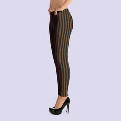 "Black and brown striped steampunk leggings with vertical stripes by 𝕬𝖉𝖆𝖒 𝕬𝖓𝖉 𝕷𝖎𝖑𝖎𝖙𝖍. These polyester/spandex leggings are made of a comfortable microfiber yarn, and they'll never lose their stretch. Available in sizes XS - 6XL. Plus sizes have wide elastic waistband. *Also available with horizontal stripes. ☥ Features Standard sizes * Fabric is 82% polyester, 18% spandex * Four-way stretch * Elastic waistband Plus sizes * 82% polyester, 18% spandex * Four-way stretch fabric that st Steampunk Leggings, Steampunk Outfits Women, Steampunk Pants, Brown Leggings, Halloween Leggings, Spandex Leggings, Striped Leggings, Plus Size Leggings, Steampunk Clothing