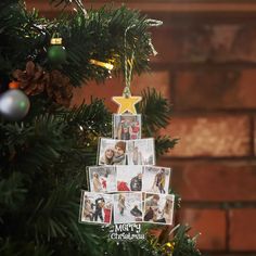 a christmas tree with pictures hanging from it