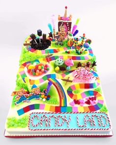 a large birthday cake decorated with candy and candies