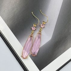 Indulge in a touch of femininity with these Soft Pink Crystal Earrings. Delicately designed, these earrings showcase pale pink crystals that shimmer in the light, adding a subtle glow to your ensemble. Their timeless elegance makes them a versatile accessory, equally suited for daytime charm or evening allure. Elevate your look with this dainty pair that speaks volumes in sophistication. Measurements: The total length from the top of the hook to bottom - 2.04 inches (52 mm) approximately. Connec Pink Crystal Earrings, Dangle Earrings Wedding, Jewellery Sketches, Jewelry Bridesmaid, Earrings Wedding, Square Earrings, Pink Earrings, Everyday Earrings, Beaded Jewelry Diy