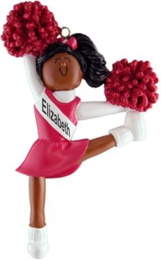 a christmas ornament with a cheerleader holding pom - poms in her hands