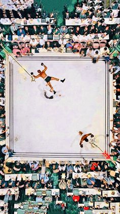 an aerial view of a tennis match with spectators