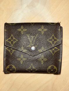 Louis Vuitton Monogram Wallet. Pre owned 100% Authentic. See photos for signs of wear. Brown Monogram Canvas Bifold Wallet, Louis Vuitton Monogram, Women's Accessories, Shoe Accessories, Monogram, Louis Vuitton, Women Accessories, Wallet, Signs