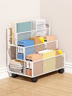 a stack of file boxes sitting on top of a wooden floor