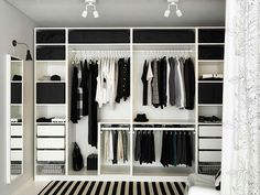 an image of a website page with clothes on shelves and closets in the background