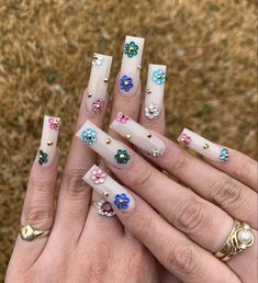 Long Nails Flower Design, 333 Nails Acrylic, Long Acrylic Spring Nails, Jewel Flower Nails, Jelly Square Nails, Square Acrylic Nails Gems, Long Acrylic Nails 2023, Pink And Red Braces, Nail Designs Rhinestones Simple