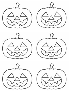 four pumpkins with faces drawn on them