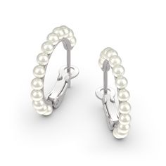 Take your look to the next level with these gleaming pearl hoop earrings. Fashioned in sterling silver, each opulent earring showcases a row of lustrous 3mm ball-shaped cultured pearls curving around the entire hoop to ensure shimmer from every angle. Polished to a bright shine, these earrings secure with latch backs.Carat Weight: 6.5 ctStone Size: 3 mmStone Type: Jeulia® StoneNumber of Stones: 26 Stone Color: Diamond WhiteStone Shape: RoundWeight: 3.63 gWidth: 2.9 mmHeight: 2.1 mmThickness: 3.7 White Hoop Pearl Earrings For Formal Occasions, White Hoop Pearl Earrings For Formal Events, White Pearl Hoop Earrings For Formal Events, Pearl White Clip-on Jewelry, Classic Pearl Hoop Huggie Earrings, Formal White Gold Hoop Pearl Earrings, Classic Pearl Huggie Earrings Small Hoop, Classic Pearl Small Hoop Huggie Earrings, Classic Round Pearl Huggie Earrings