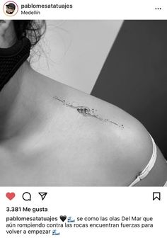 a woman with a tattoo on her shoulder