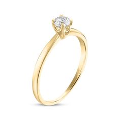 a yellow gold engagement ring with a single diamond in the center, on a white background