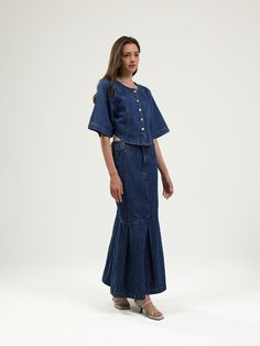 Combining decisive tailoring with a playful edge, this denim midi skirt is crafted from cotton denim in a fit-and-flare silhouette with seam detailing. Style with our Jennie Denim Cropped Jacket for a matching look or contrast with a knitted top. Twin belt loops Front fly closure with button 100% Cotton Delicate cold machine wash with similar colours Designed in Australia, made in China Model is 176cm / 5’9.5” wearing an S Size Guide (cm):S: 87 Bust, 68 Waist, 95 HipsM: 92 Bust, 73 Waist, 100 HipsL: 97 Bust, 78 Waist, 105 Hips Luxury Medium Wash Cotton Denim Skirt, Luxury Cotton Denim Blue Denim Skirt, Denim Blue Button Closure Denim Skirt, Luxury High-waisted Denim Skirt With Five Pockets, Luxury Mid-rise Denim Blue Denim Skirt, Cropped Denim Jacket, Denim Midi Skirt, Light Wash Denim, Cropped Denim