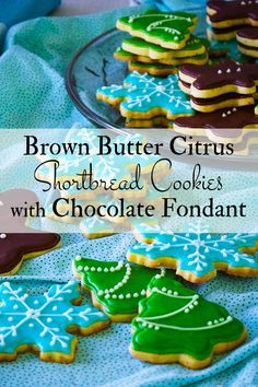 brown butter citrus shortbread cookies with chocolate fondant are on a blue tablecloth