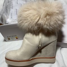 New In Box Ivory Suede Fur Trimmed 4 Inch Heel Wedge Bootie. White Fur Platform Boots, Fur Trim Boots, Brown Boots White Fur, Wedge Boots Fur, Brown And White Fur Boots, Fuzzy Heels, Wedge Bootie, Zombie Costume, Fall Inspo